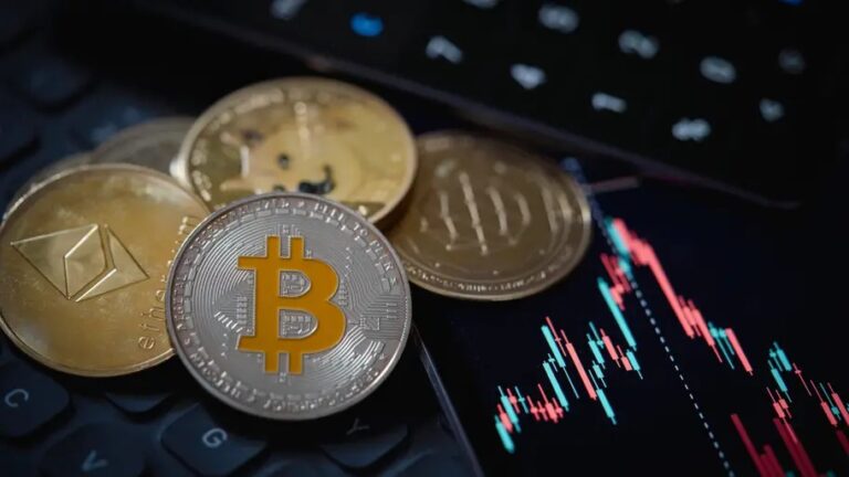 a group of coins on a black keyboard